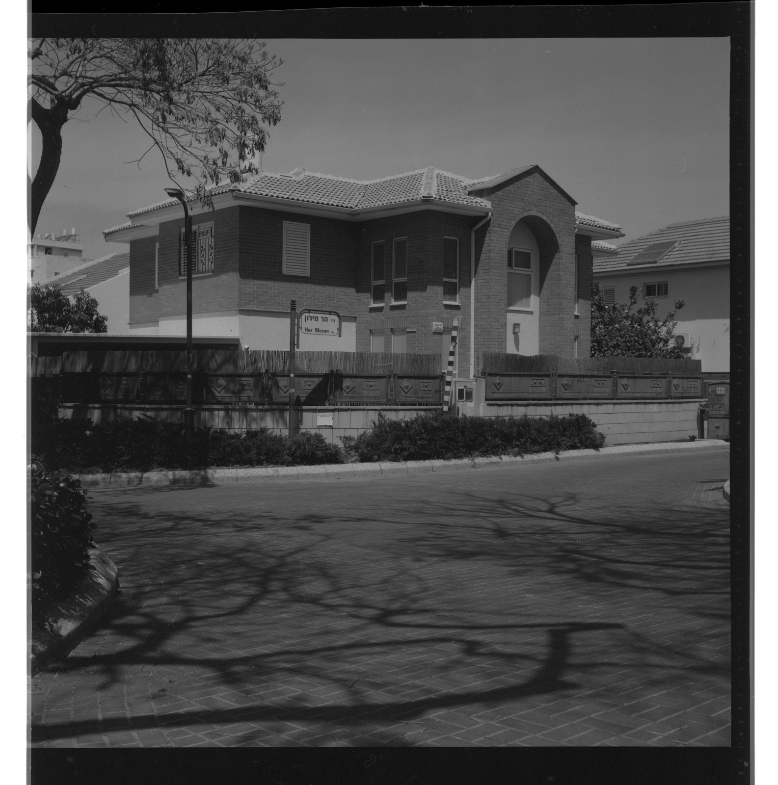 Black-and-white study of a brick-and-stone residence on Har Meron Street, Israel — architectural photography by STAS PRO